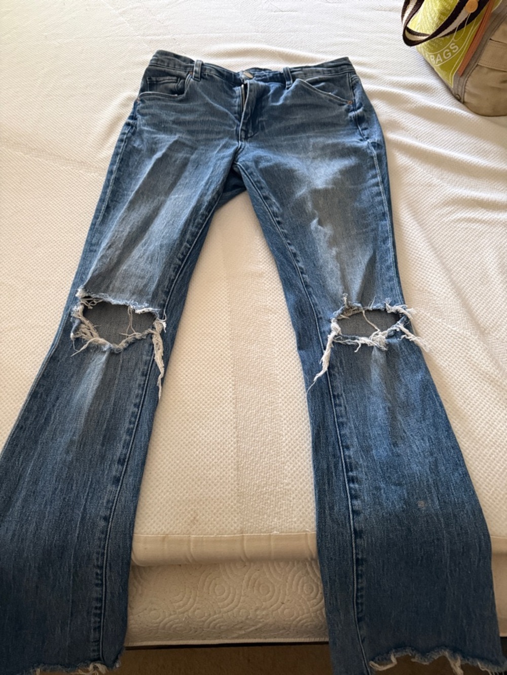Blank NYC Blue Distressed Flare Jeans with Knee Rips